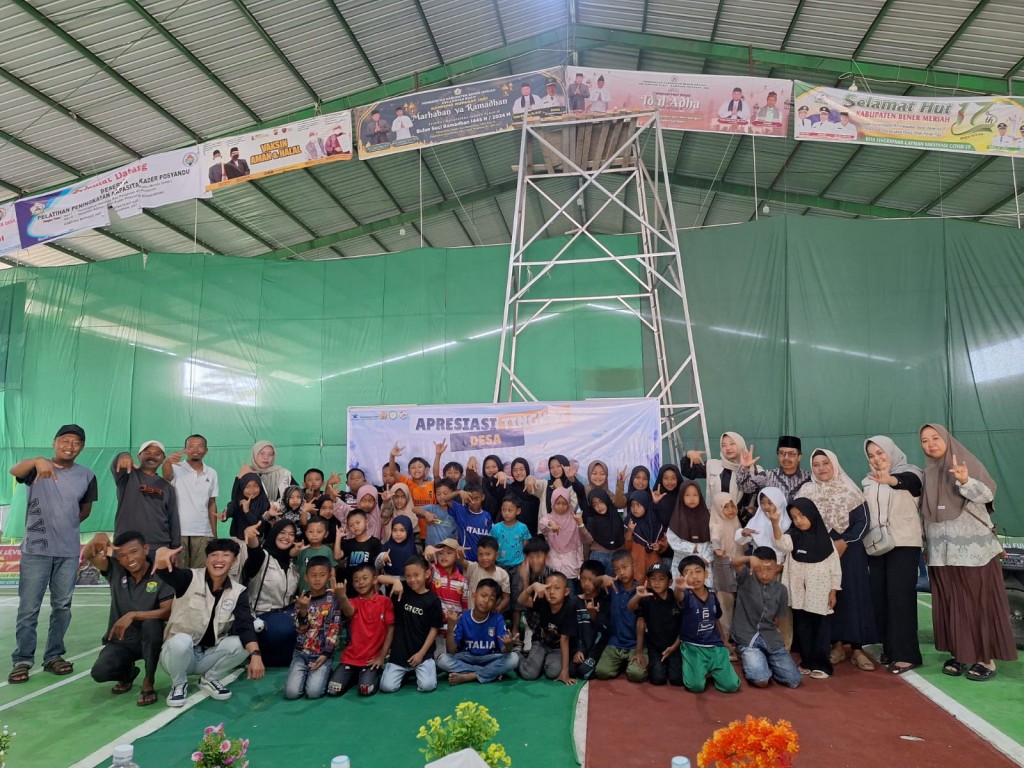 Kegiatan Apresiasi literasi bersama anak KKN UNSIYAH di Kampung Mupakat Jadi